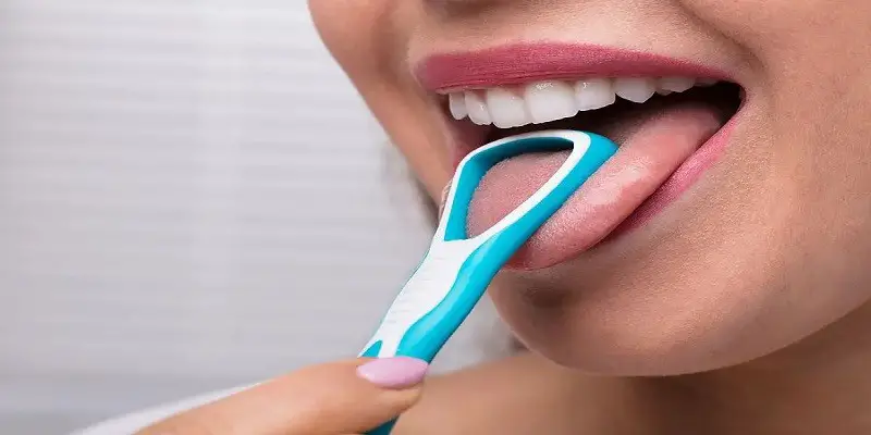 How To Clean Your Tongue Scraper